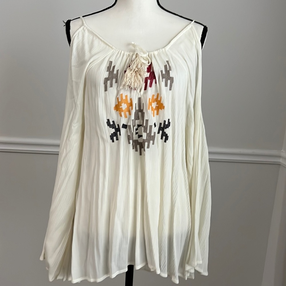 A. Peach Blouse